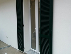 Persiana in alluminio e finestra in PVC