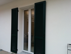 Persiana in alluminio e finestra in PVC