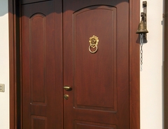 Porta di ingresso pantografata in multistrato marino